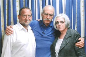 Gross with his wife, Judy, and lawyer, Scott Gilbert.