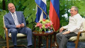 Russian Foreign Minister Lavrov laughing together with Raúl Castro.