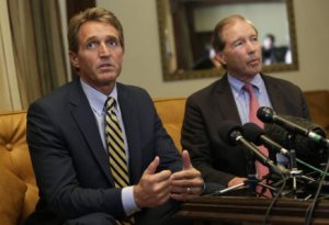 Senators Flake and Udall during a press conference in Havana.