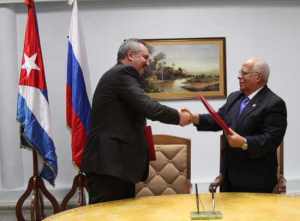 Russia's Dmitri Olegovich Rogozin meets Cuba's Ricardo Cabrisas.