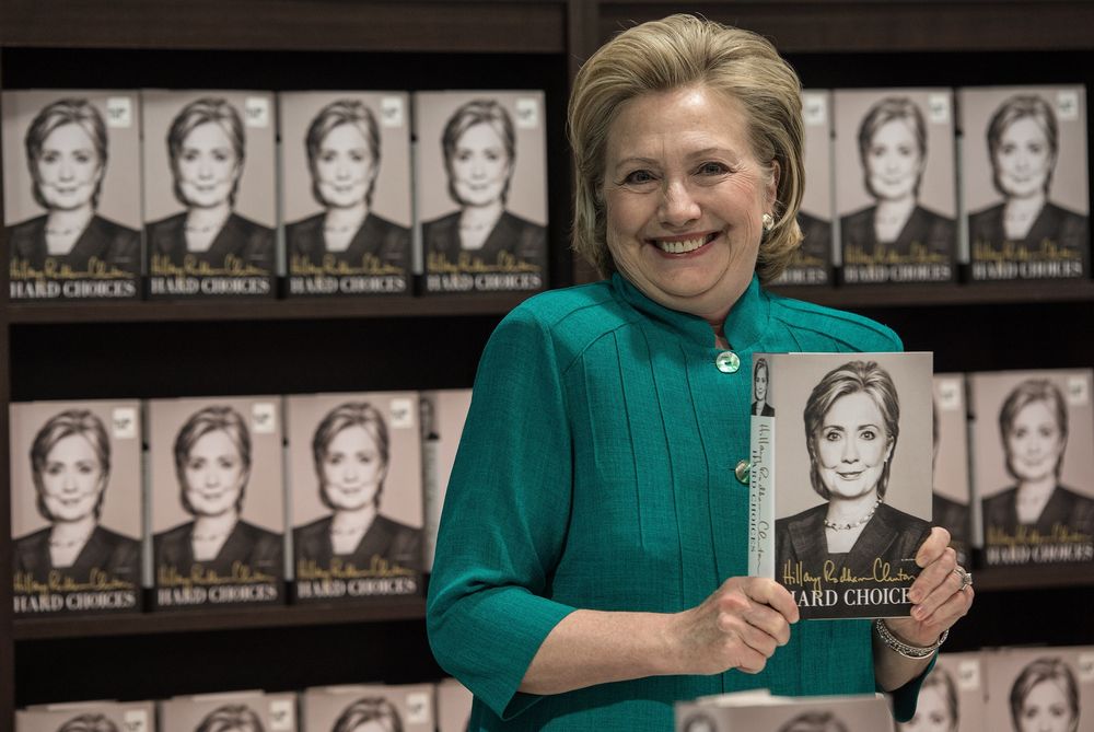 Everything's coming up Hillary. (Nicholas Kamm / AFP / Getty)