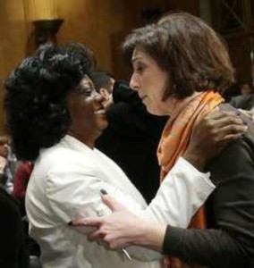 Berta Soler of the Ladies in White (Damas de Blanco) hugged by Jacobson.