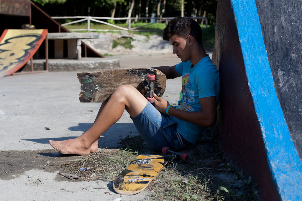 A skater takes the wheels off of a broken board. Fixing decks and sharing supplies is the norm for Cuban skaters since there are no shops to buy new gear. They rely on each other, and donations from visitors to keep skating alive in Cuba.
