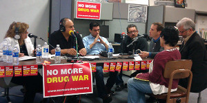 WCVI's Antonio Gonzalez in front of yellow microphone.