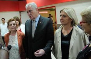 At José Martí Airport, Nikolic is accompanied by his wife, Dragica, in tan coat. To his right is an unidentified interpreter.