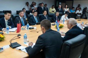 Wang Yang, second from left, at meeting with Ricardo Cabrisas, at right in foreground.