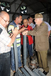 Touring La Esperanza last February, Comandante Ramiro Valdés, vice president of the Council of Ministers, verified the quality of beams made of plastic wood.