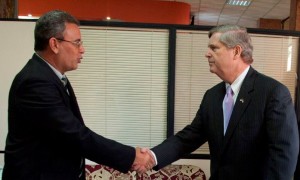 Cuban Agriculture Minister Gustavo Rodriguez Rollero welcoming his U.S. counterpart, Tom Vilsak, Thursday in Havana.