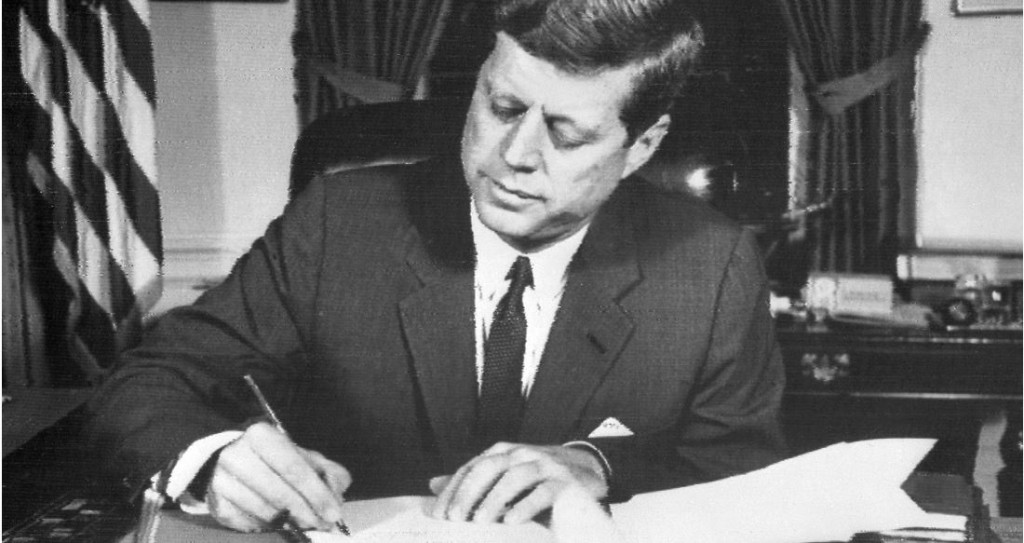 President Kennedy signing order to blockade Cuba on Oct. 24,1962.