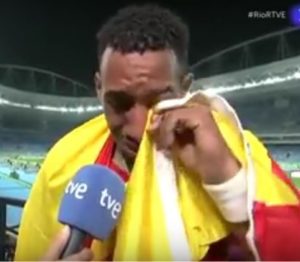 Orlando Ortega, wrapped in the Spanish flag, after garnering the silver.